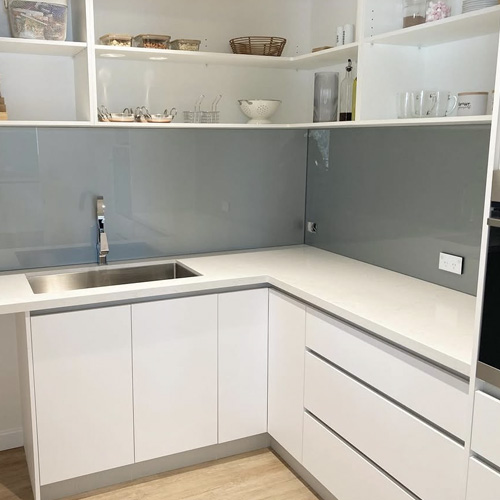 grey back painted glass kichen backsplashes