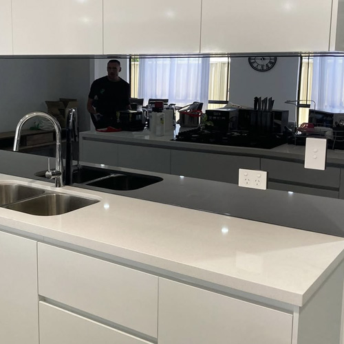 Black back painted glass kitchen backsplashes